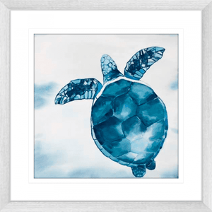 A hand-painted, silver framed turtle artwork print on canvas featuring vibrant ocean colours.