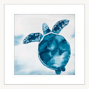 A hand-painted, white framed turtle artwork print on canvas featuring vibrant ocean colours.