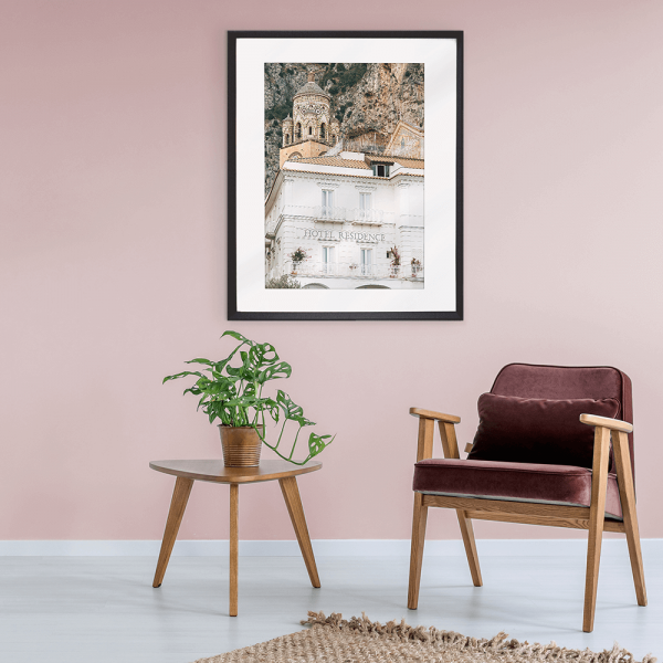 Amalfi coast hotel Residence photo in a black frame in a soft pink lounge room