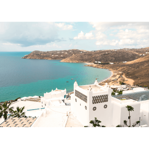 Unframed Modern coastal wall art featuring  crisp white buildings against a backdrop of the crystal blue ocean