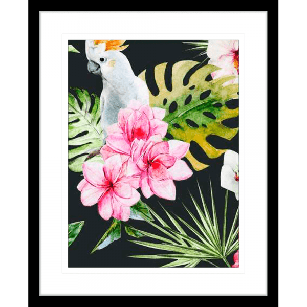 Black Framed Beach Art Australia, featuring a tropical scene with a white cockatoo perched within the green palm trees among striking pink flowers.