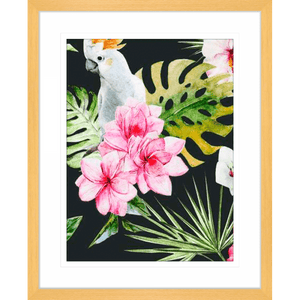 Gold Framed Beach Art Australia, featuring a tropical scene with a white cockatoo perched within the green palm trees among striking pink flowers.