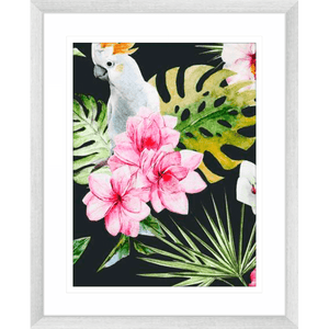 Silver Framed Beach Art Australia, featuring a tropical scene with a white cockatoo perched within the green palm trees among striking pink flowers.